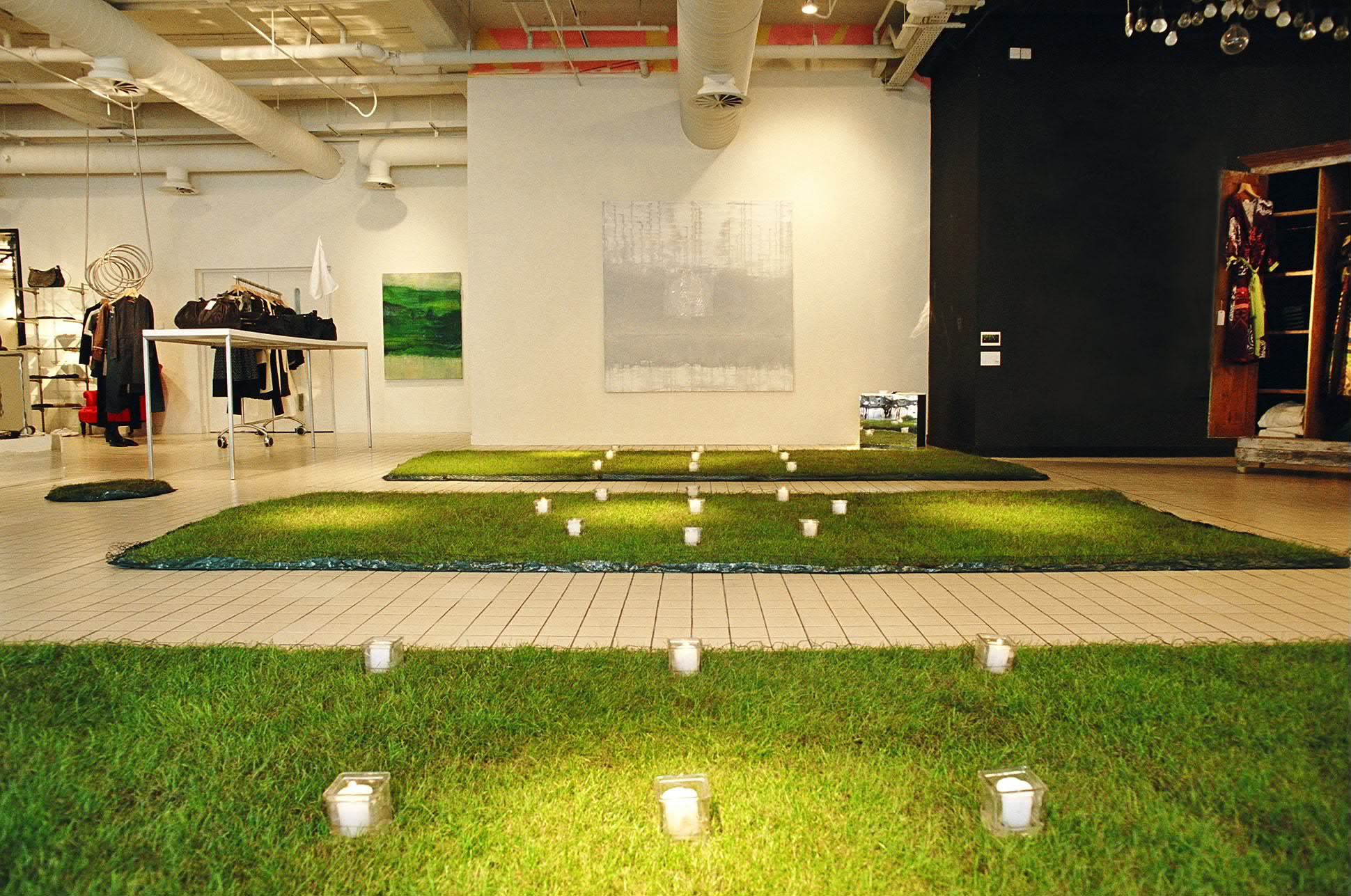 'A Pious Garden' - 2006<br><br>Art Project Space at theshopatbluebird, London, Site specific installation, Turf, Candles